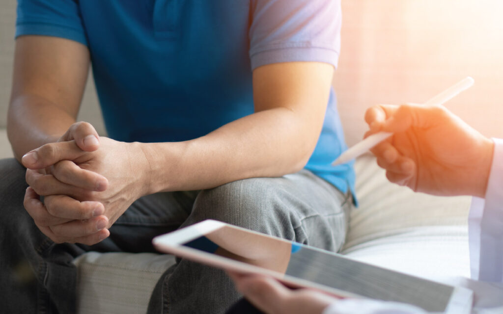 Doctor reviewing prostate warning signs